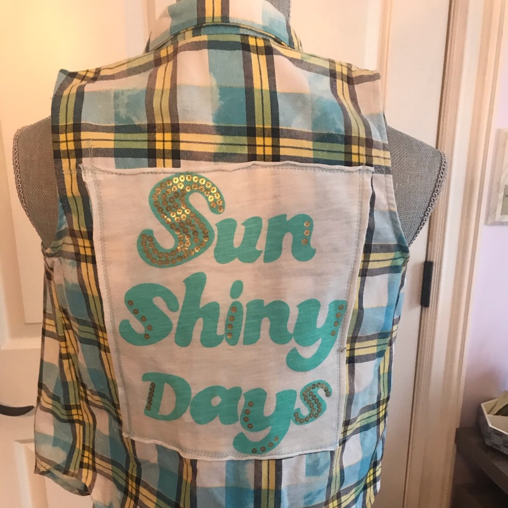 Sleeveless button down